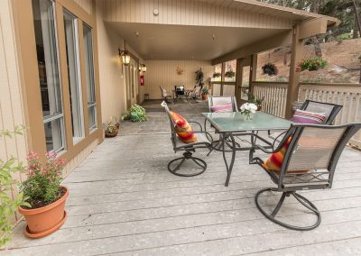 outdoor deck and soft seating at Monterey Care Center